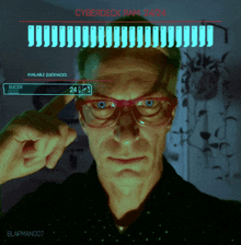 a man wearing red glasses is looking at a screen that says cyberdeck ram 24/24 on it