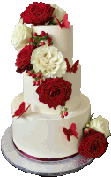 a white wedding cake with red roses and butterflies on it