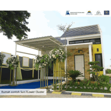 a picture of a house with the words rumah contoh sun flower cluster