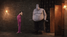 two cartoon characters are standing next to each other in a dark room ..