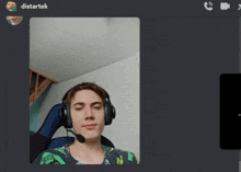 a screenshot of a video call between distartek and another person