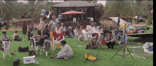 a group of people are gathered on a lush green field with a box that says " run "