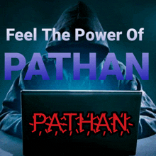 a poster that says feel the power of pathan with a person in a hoodie using a laptop