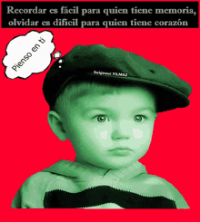 a child wearing a black hat with a thought bubble that says " pienso en ti "