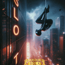 a poster for the museum bola shows a spider-man hanging upside down