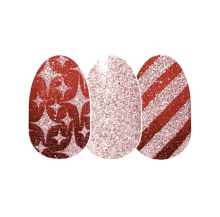 three oval shaped nails with different designs on them on a white background