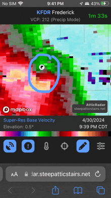 a phone screen shows a map showing the location of kfdr frederick at 9:39 pm cdt