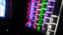 a close up of a colorful keyboard with the alt key in the middle