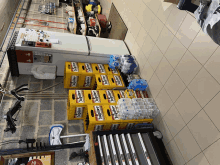 several crates of jupiler beer are lined up in a room