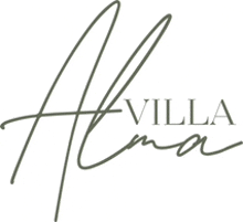 a logo for a company called villa alma with a signature .