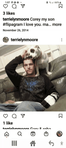 a picture of a man sitting on a couch with a dog on his head has 3 likes