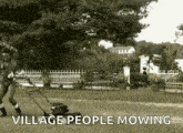 a black and white photo of a man mowing a lawn with the words `` village people mowing '' written below him .