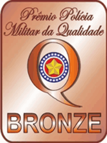 a bronze badge with a star in the middle