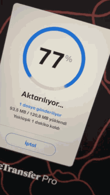 a screen that says 77 % on it with a blue circle