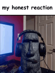 a picture of a statue wearing headphones with the words " my honest reaction " below it