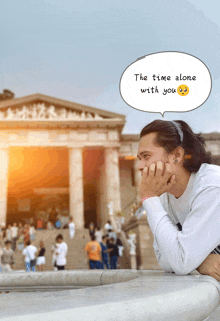 a man leaning on a railing with a speech bubble saying the time alone with you