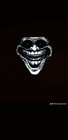 a black and white drawing of a troll face on a black background