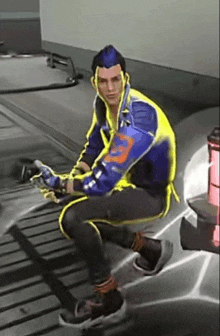 a man in a blue and yellow jacket is sitting on a bench in a room .