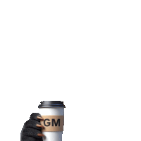 a hand is holding a cup of coffee with gm written on it