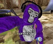 a purple gorilla wearing headphones and a hoodie that says spakey on it