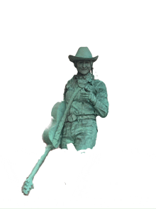 a statue of a man wearing a cowboy hat is holding a guitar