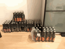 a bunch of beer bottles stacked on top of each other with one that says ' amber '