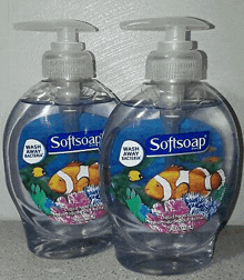 two bottles of softsoap soap with clown fish on them