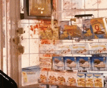 a display of snacks in a store with a sign that says ' a ' on it