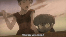 a woman is standing next to a boy and says what are you doing ?
