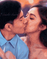 a painting of a man and woman kissing with the words nando dura on the bottom right