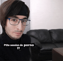 a man wearing glasses and a headband with the words ptite session de porno written below him