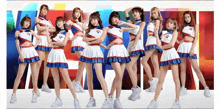 a group of cheerleaders are posing for a picture with a colorful background .