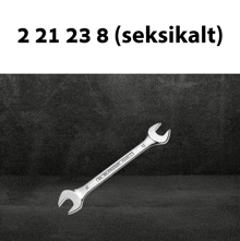 a wrench with the numbers 221 238 written on it