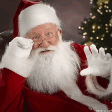 a picture of santa claus with glasses and a white beard is from memeful.com