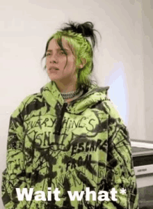 billie eilish is wearing a green hoodie with graffiti on it and a choker .