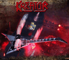 a man is playing a guitar in front of a sign that says " kreator "