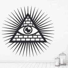 a black and white drawing of an all seeing eye in a pyramid .