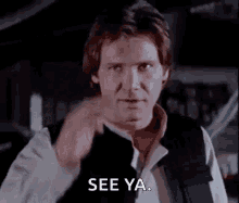 han solo from star wars is pointing at the camera and saying `` see ya . ''