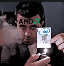 a man is holding a playing card that says intel on it