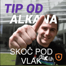 a man is giving a thumbs up in front of a sign that says tip od alkana