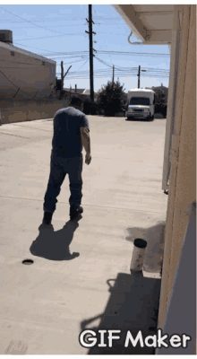 a gif maker shows a man standing on a concrete sidewalk