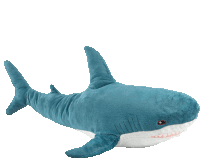 a blue stuffed shark with white teeth is laying down on a white background