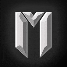 the letter m is shaped like a shield with a black background .