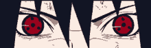 a pixel art drawing of a person 's eyes with red circles