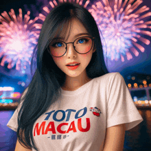 a woman wearing glasses and a toto macau t-shirt