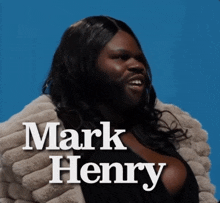 a woman with a beard and the name mark henry