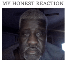 a picture of a man with the words " my honest reaction " below it