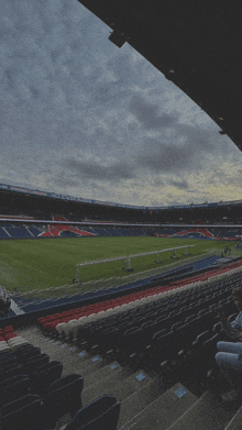 a soccer stadium with the word paris on the top