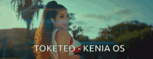 a picture of a woman with the words toketeo - kenia os on the bottom