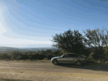 a car is parked on the side of a road